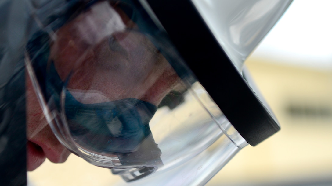 Airman 1st Class Aaron Debolt, 31st Logistics Readiness Squadron fuels facility operator, fills a liquid nitrogen cart, Aug. 10, 2016, at Aviano Air Base, Italy. Cryogenics Airmen must wear special equipment to protect themselves from the liquid oxygen and nitrogen’s dangerously low temperatures of minus 297 and minus 320 degrees Fahrenheit respectively. (U.S. Air Force photo by Senior Airman Areca T. Bell/Released)