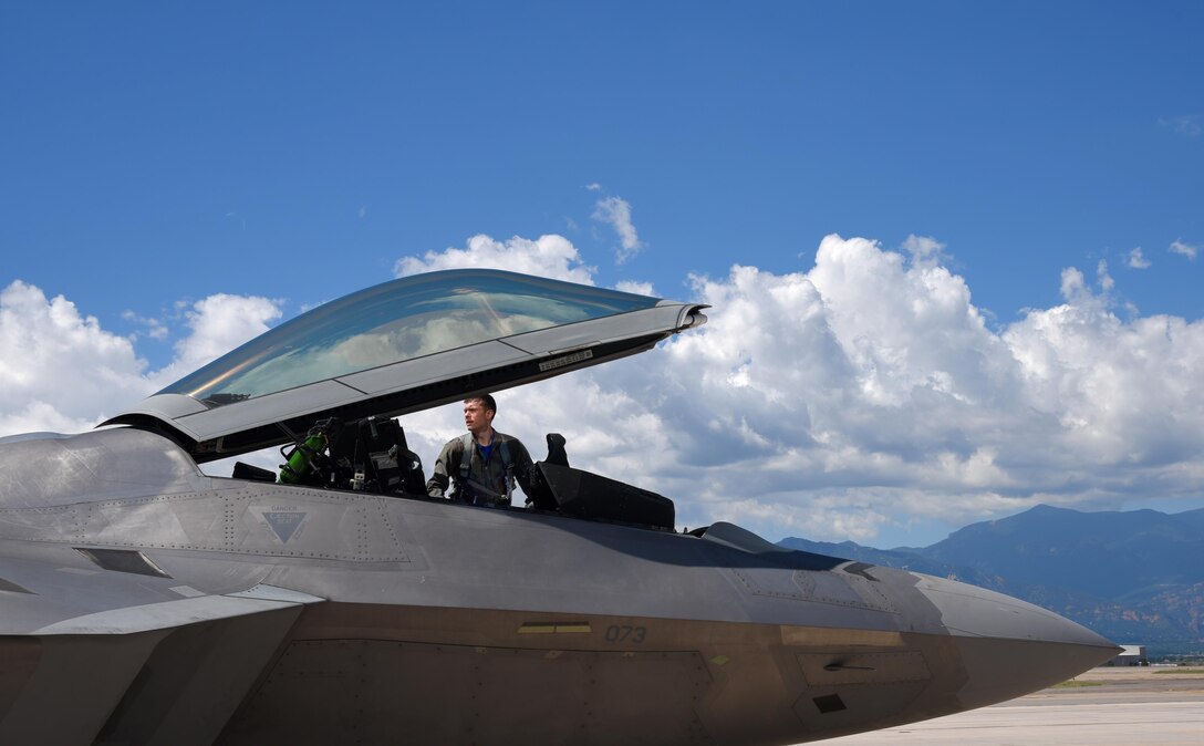 Capt. Michael Broch, a 94th Fighter Squadron F-22A Raptor aircraft commander, performs his preflight inspection at Peterson Air Force Base, Colo., Aug. 12, 2016. Assigned to the 94th FS at Langley AFB, Va., the Raptor landed at Peterson AFB to refuel as Broch and the aircraft fly back to Virginia. (U.S. Air Force photo/Airman 1st Class Dennis Hoffman)