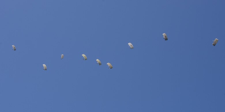 Pararescuemen from the 38th Rescue Squadron drift through the sky during a high-altitude, low-opening jump, Aug. 18, 2016, at Moody Air Force Base, Ga. Training jumps are typically conducted from 9,000 to 12,000 feet, but current deployed operations require an airdrop of 20,000 feet or more. (U.S. Air Force photo by Airman 1st Class Daniel Snider)