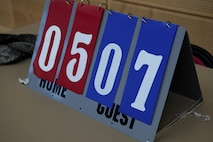 A scoreboard shows a 7-5 advantage to the Airman Leadership School students over their competition during a volleyball game at the Eifel Powerhouse on Spangdahlem Air Base, Germany, Aug. 17, 2016. Traditionally, Saber senior NCOs challenge ALS students at Spangdahlem to compete in a volleyball match in a friendly rivalry game.