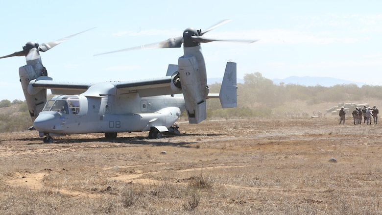 Marines from 5th Battalion, 11th Marines, walk away from an MV-22B Osprey during a casualty evacuation exercise aboard Marine Corps Base Camp Pendleton, California, August 17, 2016. Marine Medium Tiltrotor Squadron 161 supported 5th Battalion, 11th Marines, in order to increase proficiency in conducting CAS EVACS. 