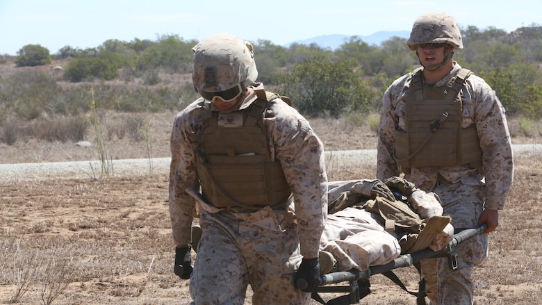 Marines with 5th Battalion, 11th Marines, carry a simulated casualty toward an MV-22B Osprey during a casualty evacuation exercise aboard Marine Corps Base Camp Pendleton, California, August 17, 2016. Marine Medium Tiltrotor Squadron 161 supported 5th Battalion, 11th Marines, in order to increase proficiency in conducting CAS EVACS.