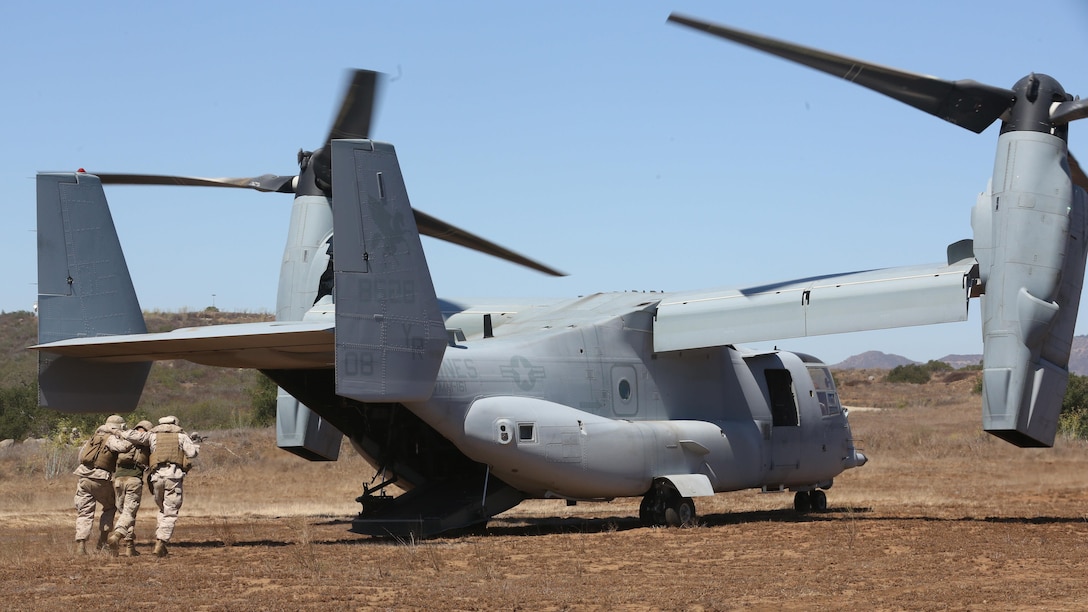 Marines with 5th Battalion, 11th Marines, assist a simulated casualty onto an MV-22B Osprey during a casualty evacuation exercise aboard Marine Corps Base Camp Pendleton, California, August 17, 2016. Marine Medium Tiltrotor Squadron 161 supported 5th Battalion, 11th Marines, in order to increase proficiency in conducting CAS EVACS. 