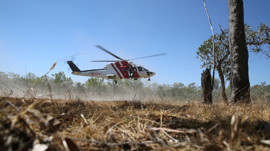 A Sikorsky S76A++ Search and Rescue helicopter hovers during SAR training at Exercise Pitch Black 2016, Royal Australian Air Force Base Tindal, Australia, August 16, 2016. The SAR team trains with local and international forces during exercises like Pitch Black to ensure all medical personnel that can respond to an aircraft emergency are capable of carrying out the same procedures. The biennial, multinational exercise involves approximately 10 allied nations and prepares these forces for possible real-world scenarios. The bilateral effort amongst Exercise Pitch Black 2016 furthermore showcases the strength amongst various militaries and solidifies the relationship across the Pacific region. 