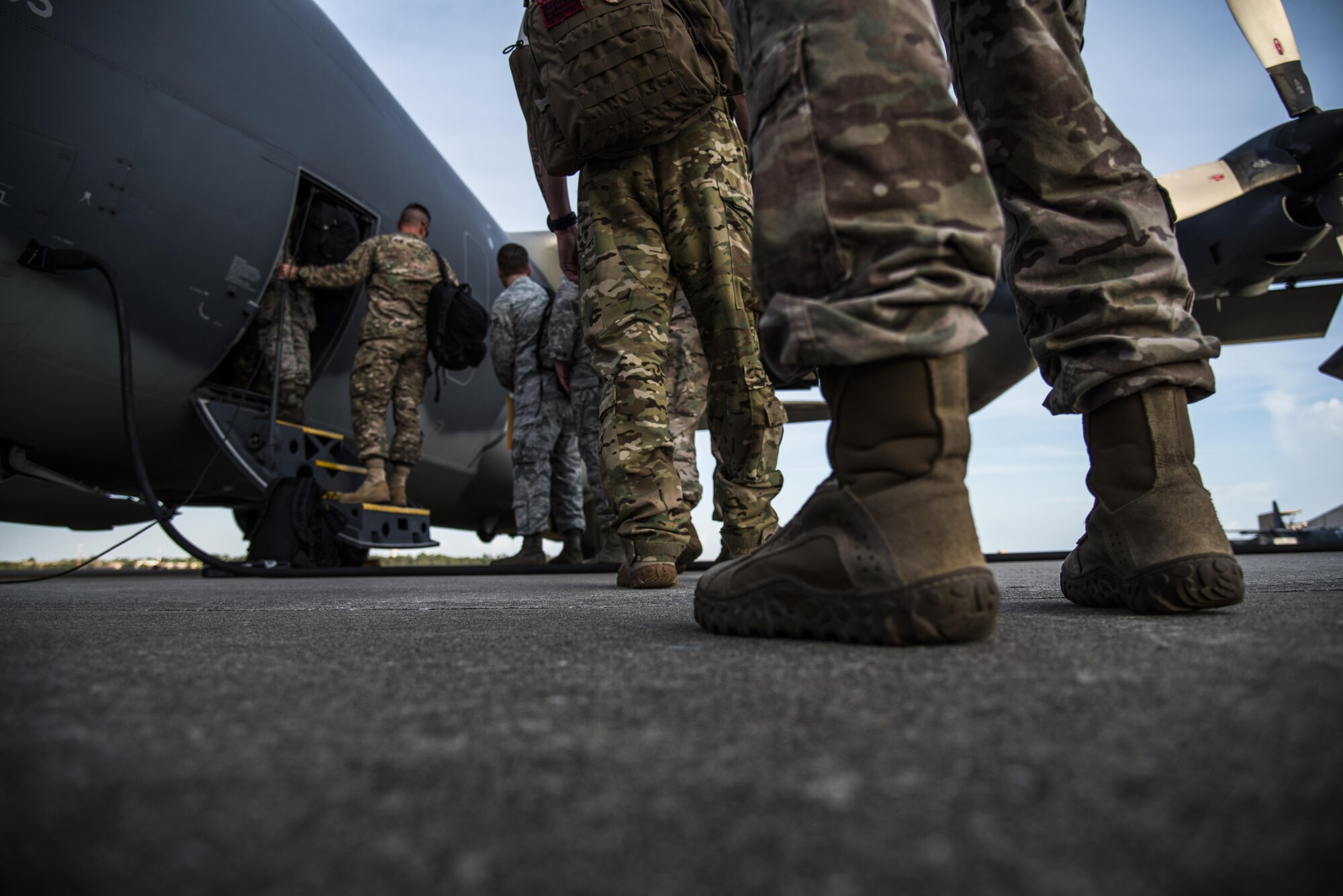 Air Commandos board an MC-130H Combat Talon II at Hurlburt Field, Fla., Aug.15, 2016. Airmen with the 1st Special Operations Wing departed for Wright Patterson Air Force Base, Ohio, to participate in Task Force Exercise Olympus Archer. Olympus Archer will maximize training opportunities for more than 230 Air Commandos, with an emphasis on medical and flying operations. (U.S. Air Force photo by Staff Sgt. Christopher Callaway)