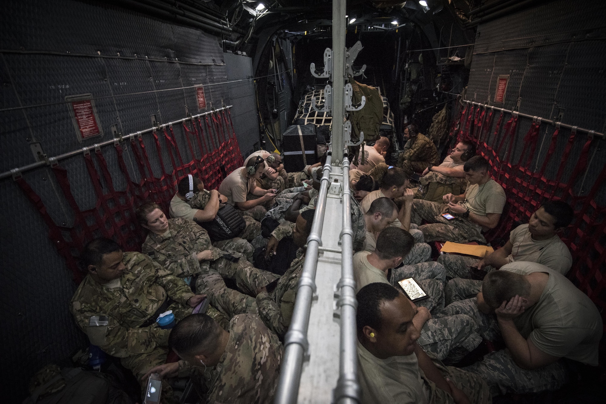 Air Commandos sit inside an MC-130H Combat Talon II en-route to Wright Patterson Air Force Base, Ohio, Aug. 15, 2016. Airmen with the 1st Special Operations Wing traveled to Wright Patterson AFB for Task Force Exercise Olympus Archer. Olympus Archer will maximize training opportunities for more than 230 Air Commandos, with an emphasis on medical and flying operations. (U.S. Air Force photo by Staff Sgt. Christopher Callaway)