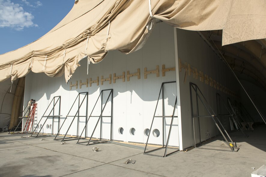 The aircraft enclosure is shown of the decontamination facility being built for upcoming chemical and biological decontamination tests on the F-35 Joint Strike Figher. (U.S. Air Force photo by Brad White)