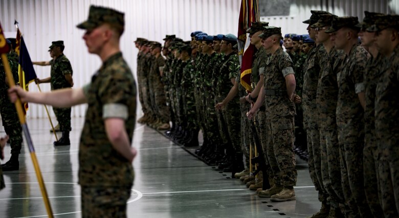 U.S. Marines with 1st Battalion, 8th Marine Regiment and 2nd Battalion, 8th Marine Regiment stand in formation with Romanian soldiers during the Black Sea Rotational Force transfer of authority on Mihal Kogalniceanu Air Base, Romania, Aug . 1, 2016. After six months, eight major exercises and more than 40 military-to-military engagements with 15 partner nations the Marines of 2/8, rotation 16.2,  relived 1/8,rotation 16.1. (U.S. Marine Corps photo by Lance Cpl. Timothy J. Lutz)