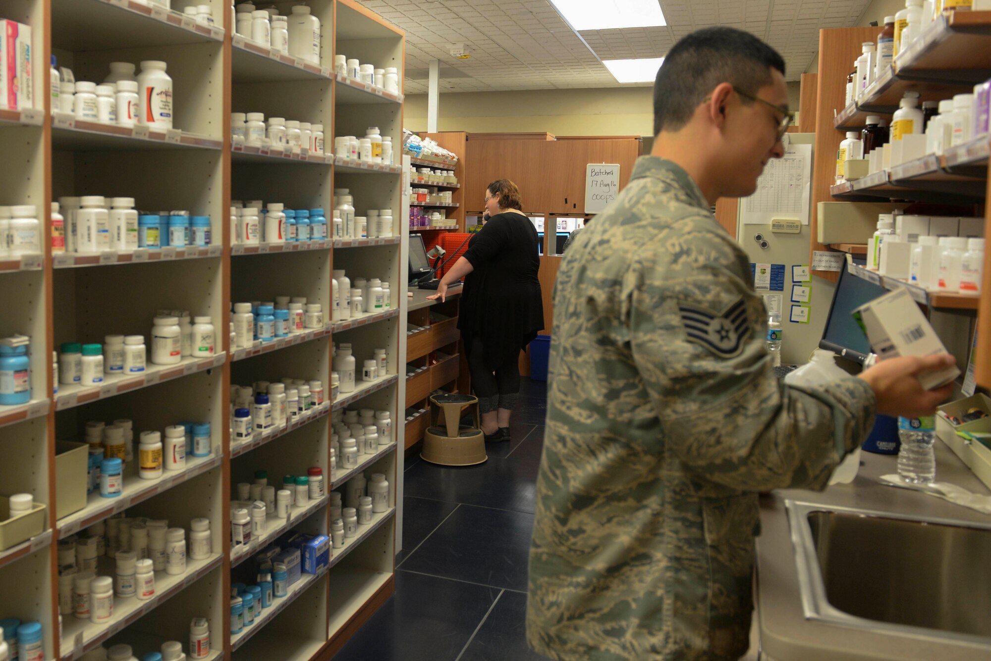 Pharmacists complete on-duty tasks at Minot Air Force Base, N.D., Aug. 17, 2016. Pharmacists provide prescriptions to all active duty military, to include personnel reliability program and arming and use-of-force Airmen. (U.S Air Force photo/Airman 1st Class Jessica Weissman)