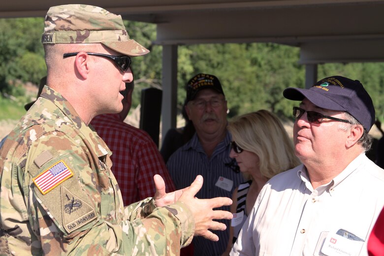 Kansas City District Commander Col. Doug Guttormsen discusses navigation along the Missouri River with Michael Collins of the Port of Kansas City.