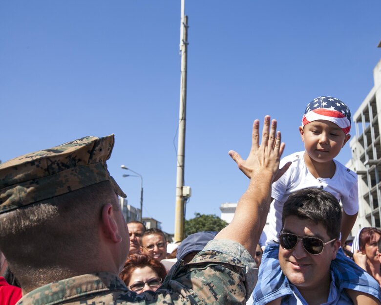 U.S. Marine Corps 1st Lt. Grant Peehler a Civil Affairs Team Leader with the Black Sea Rotational Force, spots an American Flag bandanna during the Romanian Navy Day in Constanța, Romania, Aug. 15, 2016. U.S. Sailors and Marines supporting the Black Sea Rotational Force 16.2 helped pay tribute to the prestigious history of the Romanian navy and highlighted the military’s movement toward new developments and modernizations. Black Sea Rotational Force is an annual multilateral security cooperation activity between the U.S. Marine Corps and partner nations in the Black Sea, Balkan and Caucasus regions designed to enhance participants’ collective professional military capacity, promote regional stability and build enduring relationships with partner nations.  (U.S. Marine Corps photo by Cpl. Kyle C. Talbot)