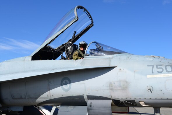 Royal Canadian Air Force Captain Yuri Mokievsky, a pilot assigned to the 409th Tactical Fighter Squadron, Canadian Forces Base Cold Lake, Alberta, prepares to take off from the flight line at Eielson Air Force Base, Alaska, during RED FLAG-Alaska (RF-A) 16-3, Aug. 18, 2016. The pilots will fly to the Joint Pacific Alaska Range Complex, which provides more than 67,000 square miles of airspace, including one conventional bombing range and two tactical bombing ranges containing 510 different types of targets and 45 threat simulators, both manned and unmanned. (U.S. Air Force photo by Airman 1st Class Cassandra Whitman)