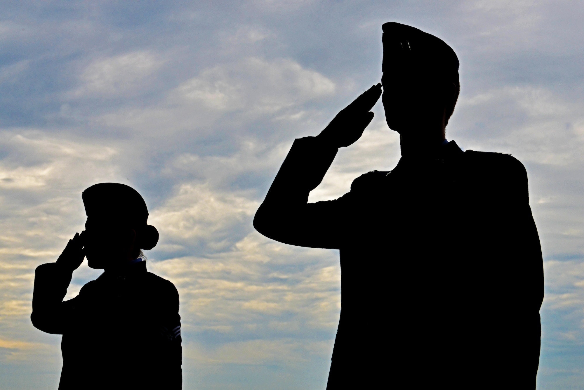U.S. Airmen assigned to the 20th Fighter Wing salute during a 20th FW change of command ceremony at Shaw Air Force Base, S.C., Aug. 19, 2016. During the change of command ceremony, Col. Daniel Lasica assumed command of the 20th FW from Col. Stephen Jost. (U.S. Air Force photo by Airman 1st Class Destinee Sweeney)