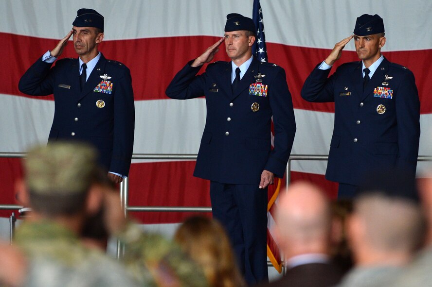 (From left) U.S. Air Force Maj. Gen. Scott Zobrist, 9th Air Force commander, Col. Stephen Jost, outgoing 20th Fighter Wing commander, and Col. Daniel Lasica, incoming 20th FW commander, salute at Shaw Air Force Base, S.C., Aug. 19, 2016. As commander of the 20th FW, Lasica will lead the wing in its mission of maintaining readiness to deploy and employ combat forces in support of operational wartime requirements worldwide. (U.S. Air Force photo by Senior Airman Michael Cossaboom)