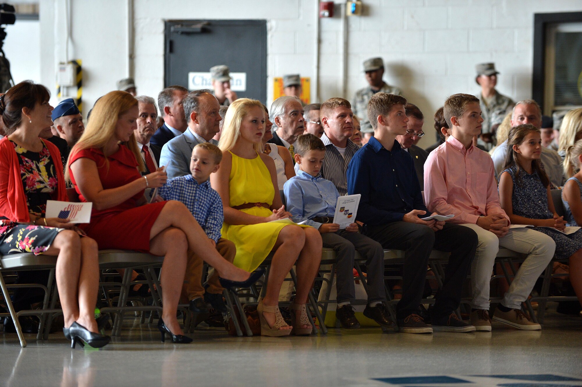 U.S. Airmen assigned to the 20th Fighter Wing listen to Col. Daniel Lasica, 20th Fighter Wing commander, during a 20th FW change of command ceremony at Shaw Air Force Base, S.C., Aug. 19, 2016. During the ceremony, Lasica assumed command of the 20th FW from Col. Stephen Jost. (U.S. Air Force photo by Senior Airman Michael Cossaboom)