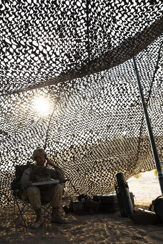 Cpl. Tyler Rafter, a field artillery cannoneer, with Battery I, 3rd Battalion, 12th Marine Regiment attached to 1st Battalion Regiment, 11th Marine Division, reports orders to Marines operating a M777A2 Howitzer during Large Scale Exercise 2016 at Marine Corps Air-Ground Combat Center Twentynine Palms, Calif., Aug. 16, 2016. LSE-16 simulates the planning, deployment and combat operations of a cohesive, combat-ready team consisting of more than 50,000 military members with I Marine Expeditionary Force. (U.S. Marine Corps photo by Sgt. Abbey Perria)