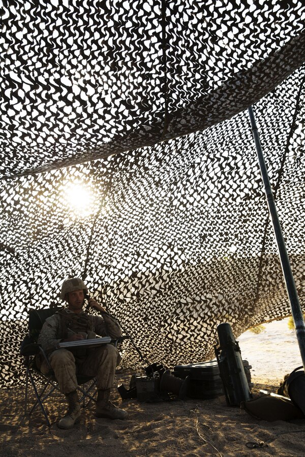 Cpl. Tyler Rafter, a field artillery cannoneer, with Battery I, 3rd Battalion, 12th Marine Regiment attached to 1st Battalion Regiment, 11th Marine Division, reports orders to Marines operating a M777A2 Howitzer during Large Scale Exercise 2016 at Marine Corps Air-Ground Combat Center Twentynine Palms, Calif., Aug. 16, 2016. LSE-16 simulates the planning, deployment and combat operations of a cohesive, combat-ready team consisting of more than 50,000 military members with I Marine Expeditionary Force. (U.S. Marine Corps photo by Sgt. Abbey Perria)
