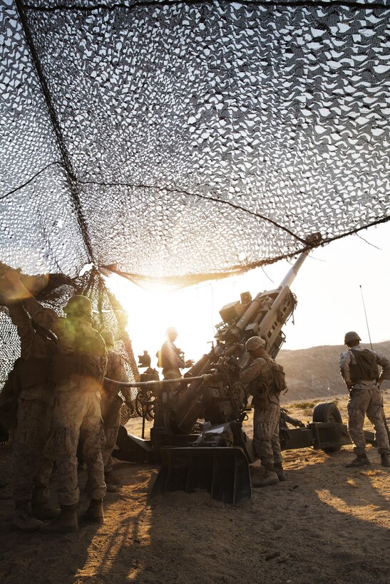 Marines with Battery I, 3rd Battalion, 12th Marine Regiment attached to 1st Battalion Regiment, 11th Marine Division load amunition into a M777A2 Howitzer during Large Scale Exercise 2016 at Marine Corps Air-Ground Combat Center Twentynine Palms, Calif., Aug. 16, 2016. LSE-16 simulates the planning, deployment and combat operations of a cohesive, combat-ready team consisting of more than 50,000 military members with I Marine Expeditionary Force. (U.S. Marine Corps photo by Sgt. Abbey Perria)
