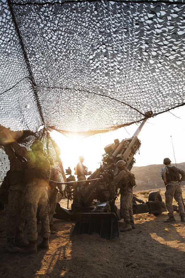 Marines with Battery I, 3rd Battalion, 12th Marine Regiment attached to 1st Battalion Regiment, 11th Marine Division load amunition into a M777A2 Howitzer during Large Scale Exercise 2016 at Marine Corps Air-Ground Combat Center Twentynine Palms, Calif., Aug. 16, 2016. LSE-16 simulates the planning, deployment and combat operations of a cohesive, combat-ready team consisting of more than 50,000 military members with I Marine Expeditionary Force. (U.S. Marine Corps photo by Sgt. Abbey Perria)