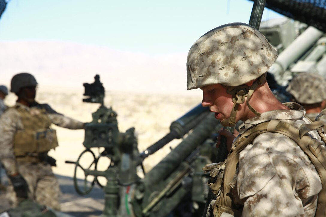 A Marine with Battery I, 3rd Battalion, 12th Marine Regiment, attached to 1st Battalion, 11th Marine Regiment, 1st Marine Division prepares to fire the M777A2 Howitzer during Large Scale Exercise 2016 at Marine Corps Air-Ground Combat Center Twentynine Palms, Calif., Aug. 16, 2016. LSE-16 simulates the planning, deployment and combat operations of a cohesive, combat-ready team consisting of more than 50,000 military members with I Marine Expeditionary Force. (U.S. Marine Corps photo by Pvt. Robert Bliss)