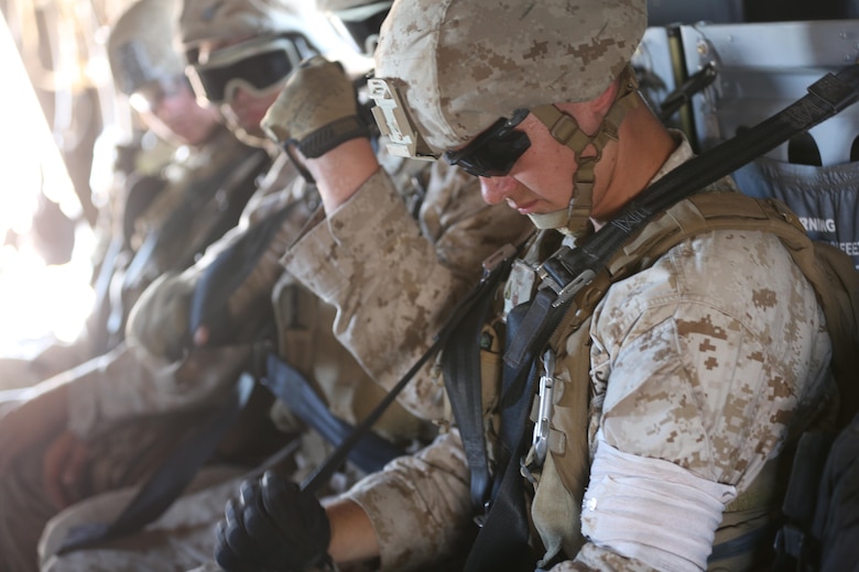 Marines with 5th Battalion, 11th Marine Regiment, sit in an MV-22B Osprey during casualty evacuation training aboard Marine Corps Base Camp Pendleton, Calif., Aug. 17. Marine Medium Tiltrotor Squadron (VMM) 161 supported 5th Battalion, 11th Marines, in order to increase proficiency in conducting CAS EVACS. (U.S. Marine Corps photo by Pfc. Jake M. T. McClung/Released)
