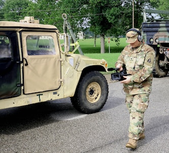 MUSCATATUCK URBAN TRAINING CENTER, Ind. - Army Reserve Public Affairs Soldier, Spc.Trace Lundberg, provides media coverage for 101st Airborne Division Soldiers conducting Chemical Biological Radiological, and Nuclear training, on August 14th, 2016. (U.S. Army Reserve photo by Sgt. Michael Adetula, U.S. Army Reserve/Released)