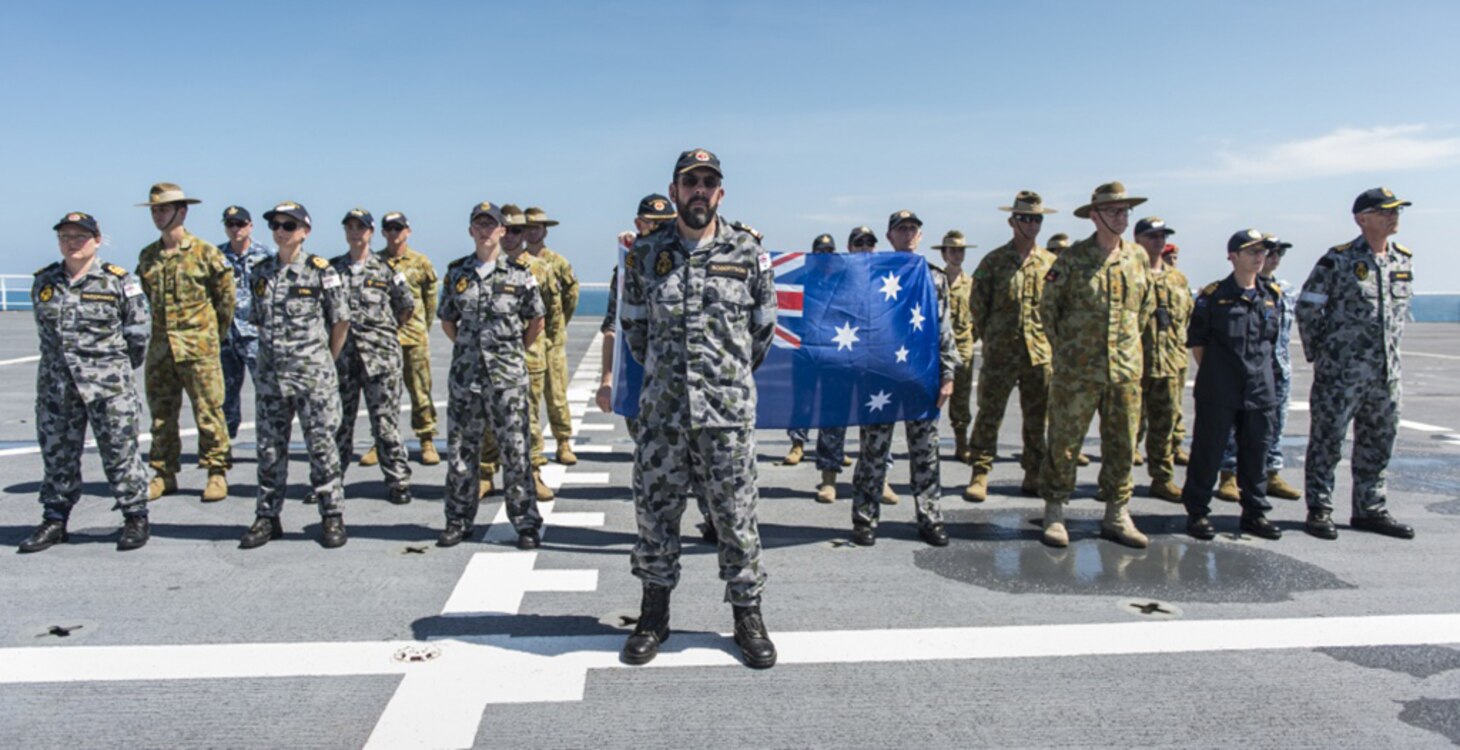 Australian and New Zealand service members stand in formation to honor the wreckage of modified Leander-class light cruiser HMAS Perth (D29) and Northampton-class cruiser USS Houston (CA 30) as hospital ship USNS Mercy (T-AH 19) passes, Aug. 17, 2016.  Both ships sank March 1, 1942, during the World War II Battle of Sunda Strait. Mercy is sailing to the final mission stop of Pacific Partnership 2016 in Padang, Indonesia. Upon arrival, partner nations will work side-by-side with local military and non-government organizations to conduct cooperative health engagements, community relation events, subject matter expert exchanges and a SAR exercise to better prepare for a natural disaster or crisis.