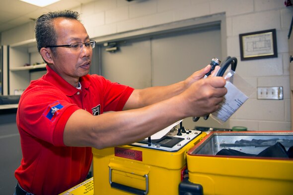 Danny Brodeur, 23d Component Maintenance Squadron precision measurement equipment laboratory support services technician, checks inventory during a delivery pick-up, Aug. 17, 2016, at Moody Air Force Base, Ga. Brodeur retired from Moody in 2011 as the 23d Equipment Maintenance Squadron material management superintendent and says his esprit de corps stays alive when he sees Airmen deliver and pickup testable equipment. (U.S. Air Force photo by Airman 1st Class Greg Nash)