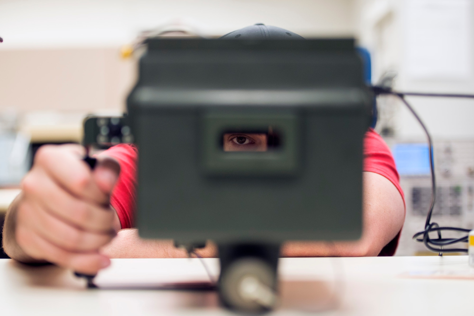 Jeff Schlitter, 23d Component Maintenance Squadron precision measurement equipment laboratory calibration technician, looks inside a radar test set during a functional test,  Aug. 17, 2016, at Moody Air Force Base, Ga. The PMEL’s motto is ‘one team, one seam,’ which highlights their symbiotic work relationship and good rapport with Team Moody and the 125th Fighter Wing, Florida Air National Guard, according to the lab. (U.S. Air Force photo by Airman 1st Class Greg Nash)
