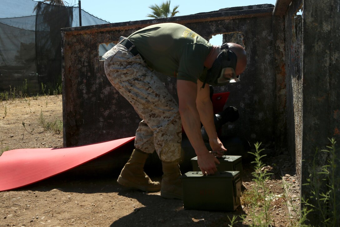 A Marine lifts two ammo cans during the 2nd Annual Tactical Athlete Championship aboard Marine Corps Air Station Miramar, Calif., Aug. 17. The competition was a part of the Marine Corps’ High Intensity Tactical Training program and tested the strengths and abilities of Marines from different installations around the Corps. (U.S. Marine Corps photo by Pfc. Liah Kitchen/Released)