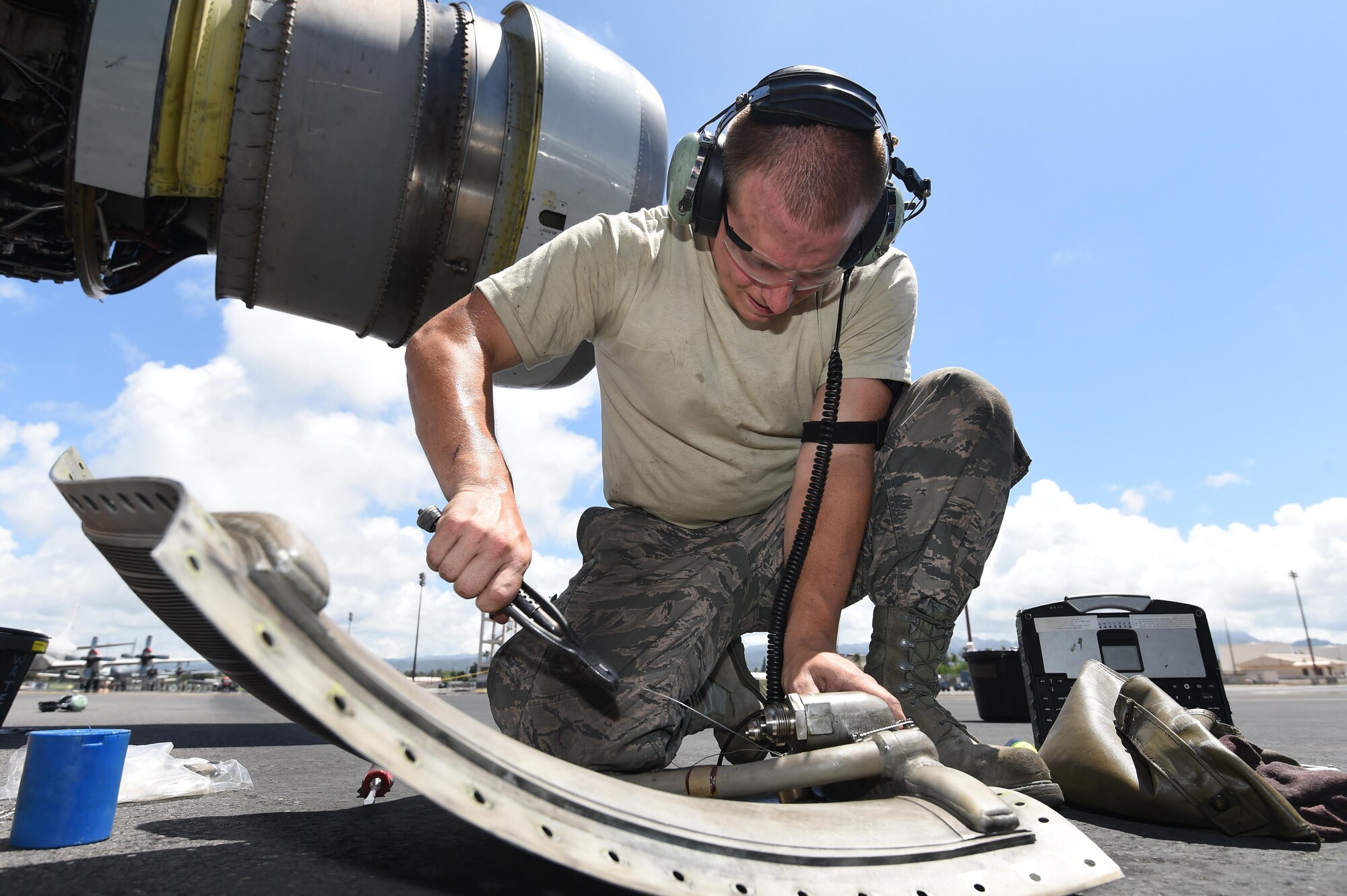 Staff Sgt. Austin Paisley, assigned to the 552nd Aircraft Maintenance Squadron, prepares an engine part for an E-3 Sentry on July 25, 2016, at Joint Base Pearl Harbor-Hickam, Hawaii. More than 125 Airmen from the 513th Air Control Group and 552nd Air Control Wing are deployed to Hawaii in support of the Rim of the Pacific 2016 exercise. Twenty-six nations, more than 40 ships and submarines, more than 200 aircraft and 25,000 personnel are participating in RIMPAC from June 30 to Aug. 4, in and around the Hawaiian Islands and Southern California. The world's largest international maritime exercise, RIMPAC provides a unique training opportunity that helps participants foster and sustain the cooperative relationships that are critical to ensuring the safety of sea lanes and security on the world's oceans. RIMPAC 2016 is the 25th exercise in the series that began in 1971. (U.S. Air Force photo by 2nd Lt. Caleb Wanzer)