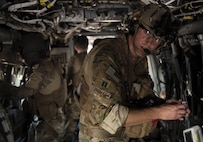 Capt. Aaron Thomas, a flight surgeon with the 1st Special Operations Medical Group, prepares his medical gear during Task Force Exercise Olympus Archer at Wright Patterson Air Force Base, Ohio, Aug. 18, 2016. Olympus Archer focuses on maximizing training opportunities for more than 230 Air Commandos, with the 1st Special Operations Wing, emphasizing on medical operations in conjunction with flying operations. (U.S. Air Force photo by Staff Sgt. Christopher Callaway)