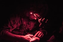 Capt. Aaron Thomas, a flight surgeon with the 1st Special Operations Medical Group, examines a patient’s arm during Task Force Exercise Olympus Archer at Wright Patterson Air Force Base, Ohio, Aug. 18, 2016. Olympus Archer focuses on maximizing training opportunities for more than 230 Air Commandos, with the 1st Special Operations Wing, emphasizing on medical operations in conjunction with flying operations. (U.S. Air Force photo by Staff Sgt. Christopher Callaway)