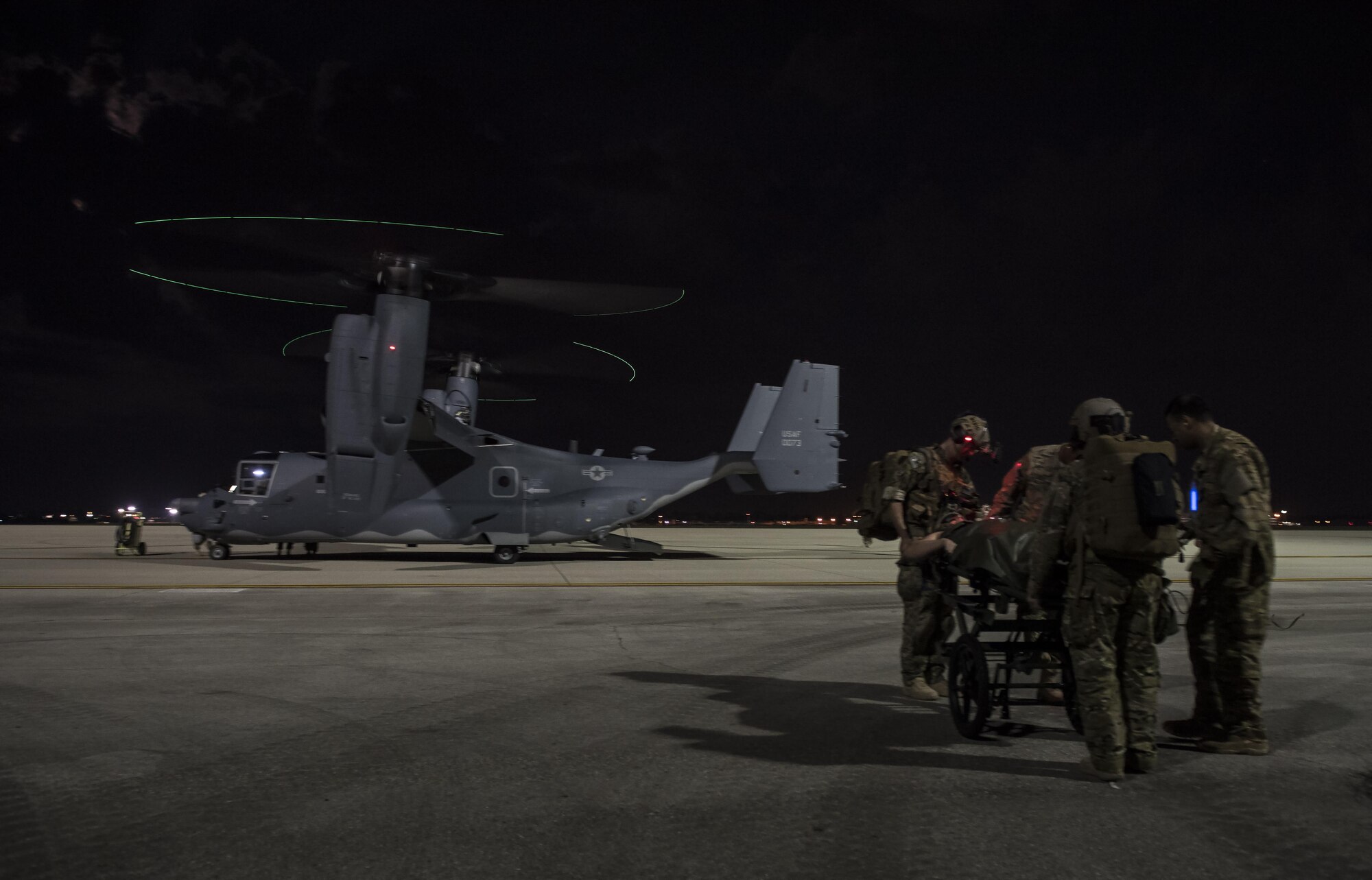 Air Commandos from the 1st Special Operations Medical Group work on a patient during Task Force Exercise Olympus Archer at Wright Patterson Air Force Base, Ohio, Aug. 18, 2016.  Olympus Archer focuses on maximizing training opportunities for more than 230 Air Commandos, with the 1st Special Operations Wing, emphasizing on medical operations in conjunction with flying operations. (U.S. Air Force photo by Staff Sgt. Christopher Callaway)