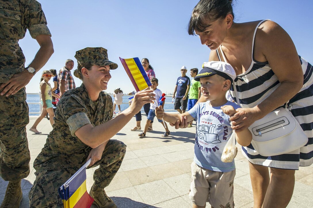 Marine Corps Cpl. Colleen Moran celebrates Romania’s Navy Day with community members in Constanța, Romania, Aug. 15, 2016. Moran is assigned to the Black Sea Rotational Force 16.2, a security cooperation activity between the Marine Corps and partner nations in the Black Sea, Balkan and Caucasus regions to promote regional stability and build enduring relationships. Marine Corps photo by Cpl. Kyle C. Talbot