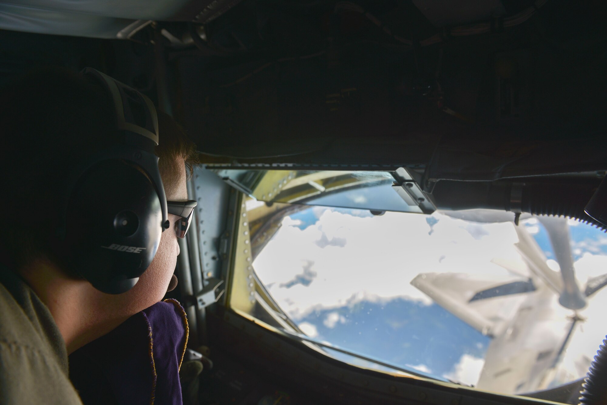U.S. Air Force Senior Airman Andy Birmingham, a boom operator assigned to the 99th Air Refueling Squadron, out of Birmingham Air National Guard Base, Ala., refuels a U.S. Air Force F-22 Raptor multi-role fighter aircraft assigned to the 525th Fighter Squadron out of Joint Base Elmendorf-Richardson, Alaska, Aug. 16, 2016, in the Joint Pacific Alaska Range Complex during RED FLAG-Alaska (RF-A) 16-3. Air refueling allows aircraft participating in RF-A to stay in the air longer and extend sortie times. (U.S. Air Force photo by Airman Isaac Johnson)
