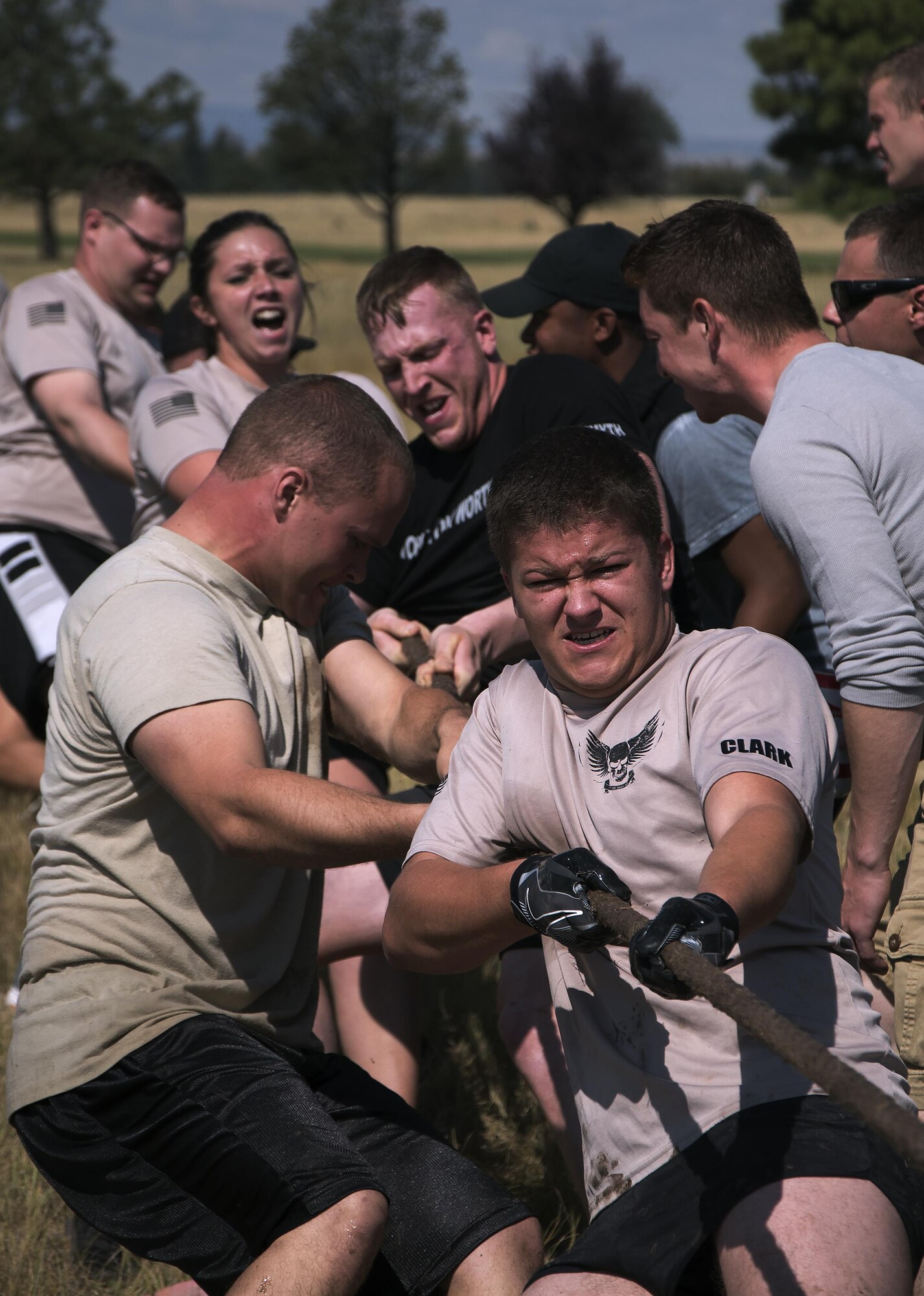 The 790th Missile Security Forces Squadron tug-o-war team struggles to pull their opponents into a mud pit during the annual Frontiercade competition at F.E. Warren Air Force Base, Wyo., Aug. 19, 2016. The 790th MSFS team came in second place at the event, losing to the 90th Security Support Squadron. (U.S. Air Force photo by Senior Airman Brandon Valle)