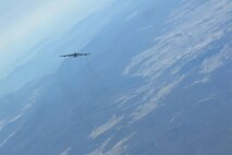 A U.S. Air Force B-52H Stratofortress returning from deployment at Andersen Air Force Base, Guam, flies over the 50th Anniversary of the Battle of Long Tan and Vietnam Remembrance Day ceremony at Canberra, Australia, Aug. 18, 2016. At the request of the Australian government, two Pacific Air Forces B-52s already scheduled to fly a training mission in support of exercise Pitch Black, supported the event commemorating the U.S. and Australia's strong alliance during the Vietnam War that continues to this day. (U.S. Air Force photo by Staff Sgt. Sandra Welch)