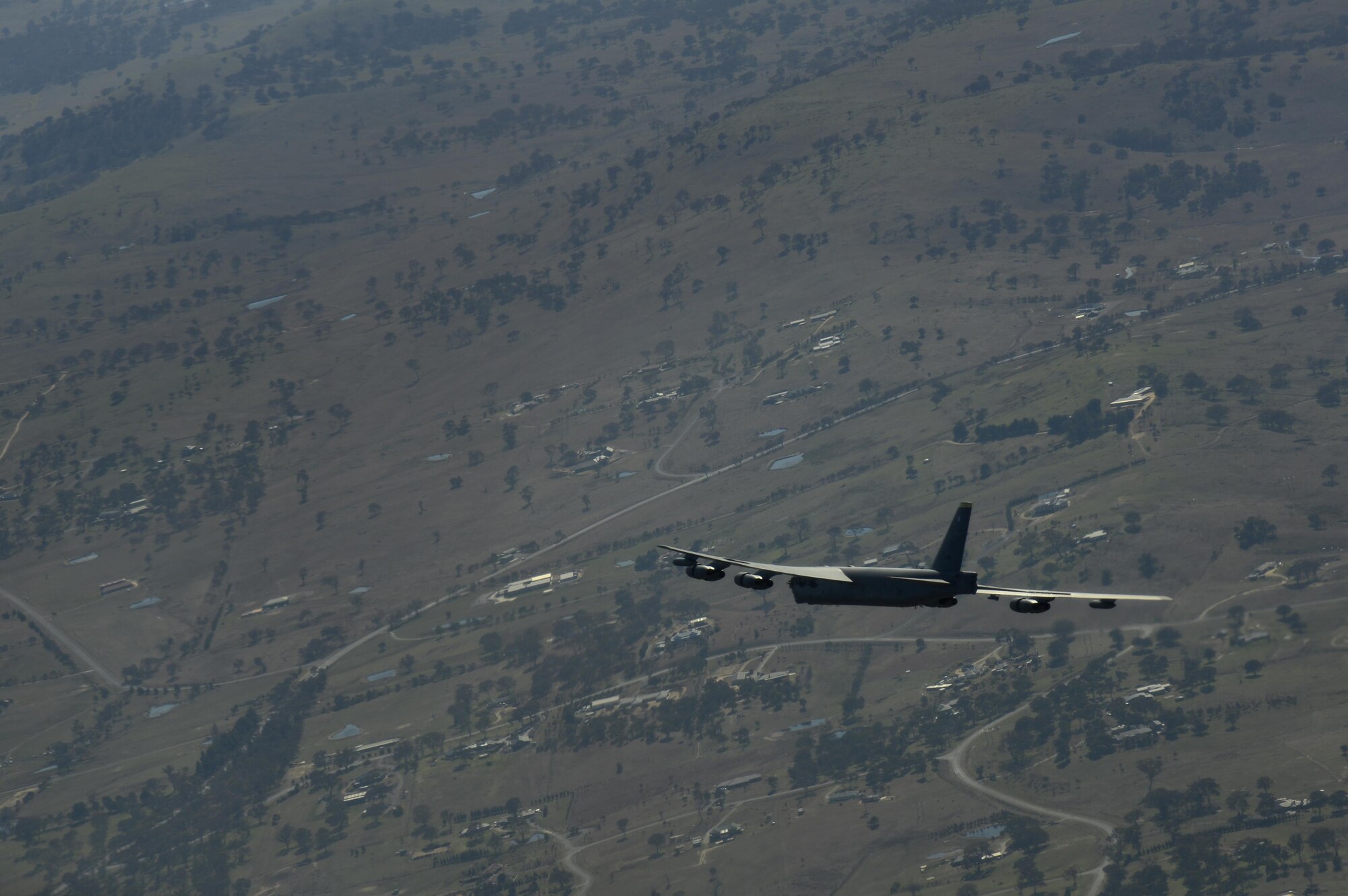 A U.S. Air Force B-52H Stratofortress conducts a training mission over the Delamere Training Range in Northern Australia during Exercise Pitch Black, Aug. 18, 2016. PB16, a multilateral exercise hosted by Australia from Jul. 29 through Aug. 19, allowed participant nations to exercise deployed units in the tasking, planning and execution of offensive counter air and offensive air support while utilizing one of the largest training airspace areas in the world. (U.S. Air Force photo by Staff Sgt. Sandra Welch)