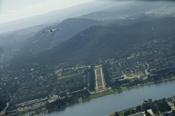 A U.S. Air Force B-52H Stratofortress returning from deployment at Andersen Air Force Base, Guam, flies over the 50th Anniversary of the Battle of Long Tan and Vietnam Remembrance Day ceremony at Canberra, Australia, Aug. 18, 2016. At the request of the Australian government, two Pacific Air Forces B-52s already scheduled to fly a training mission in support of exercise Pitch Black, supported the event commemorating the U.S. and Australia's strong alliance during the Vietnam War that continues to this day. (U.S. Air Force photo by Staff Sgt. Sandra Welch)