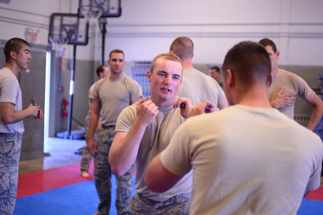 U.S. Air Force Senior Airman Brandan Able, with the 157th Security Forces Squadron, New Hampshire Air National Guard, prepares to defend himself during combative training, Aug. 3, 2016, at the New Hampshire National Guard Training Site, Center Strafford, N.H.  (Air National Guard photo by Airman 1st Class Ashlyn J. Correia)