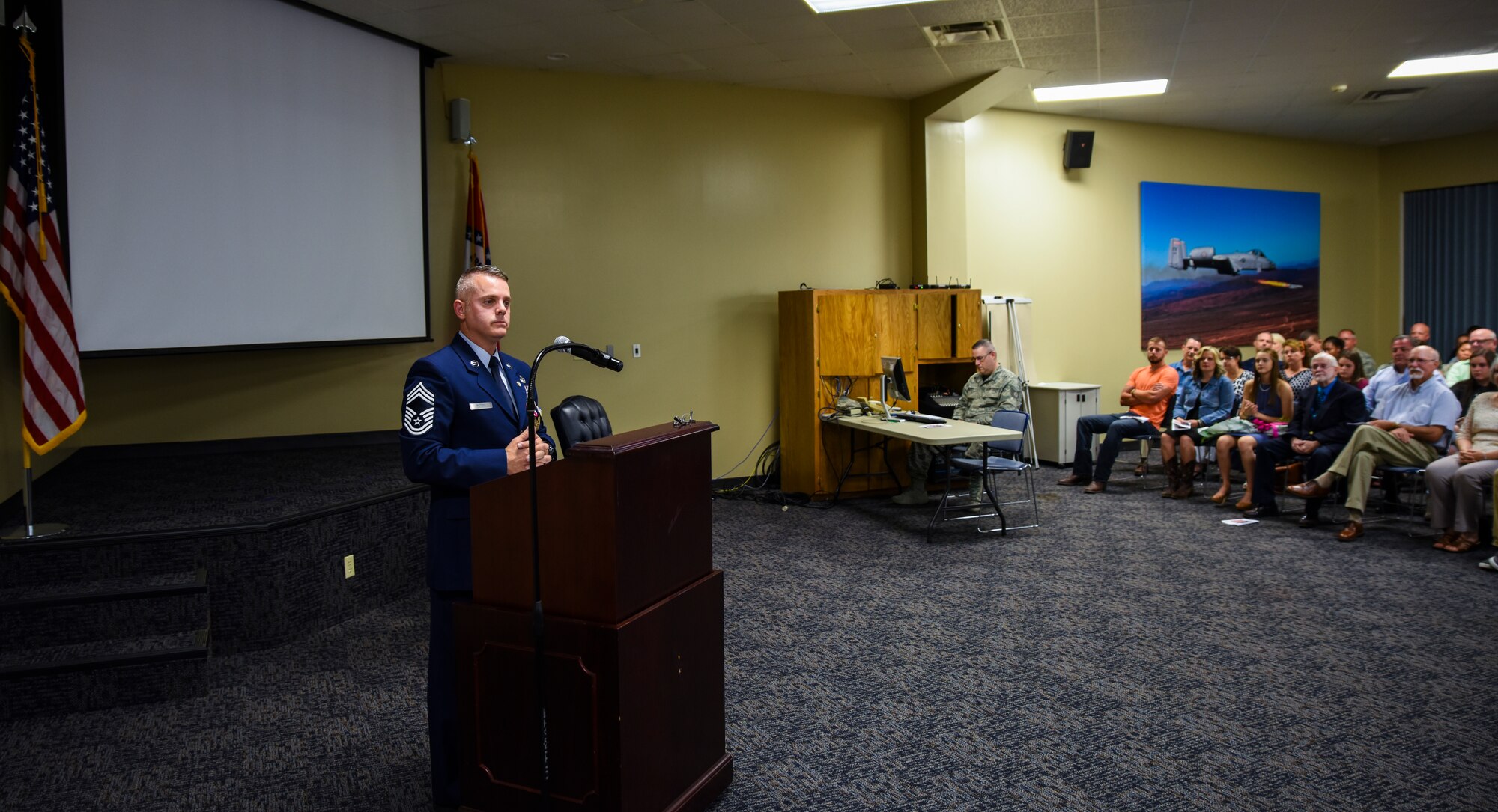 Chief Master Sgt. Bryan Peters, 188th Force Support Squadron supervisor, stresses the importance of leaders to make tough decisions during his retirement ceremony Aug. 7, 2016, at Ebbing Air National Guard Base, Fort Smith, Ark. Peters has served in the Air National Guard for over 24 years, all with the 188th Wing. (U.S. Air National Guard photo by Senior Airman Cody Martin)