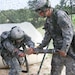 FORT MCCOY, Wis. -- Army Reserve Soldiers from the 651st Quartermaster Company out of Evansville, Wyo., perform maintenance on a water pressure hose as part of the Combat Support Training Exercise here in Fort McCoy, Wis., on Aug. 16, 2016. CSTX immerses Army Reserve Soldiers and other service members in real-world  training scenarios to enhance unit readiness in the planning, preparation, and execution of combat service support operations. (U.S. Army Reserve photo by Spc. Christopher A. Hernandez, 345th Public Affairs Detachment)