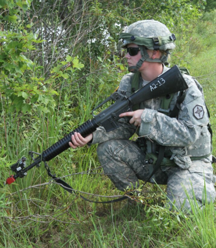 FORT MCCOY, WIs. -- Spc. Jessica Neidhardt, a water treatment specialist from the 651st Quartermaster Company out of Evansville, Wyo., conducts perimeter security during a simulated mortar attack as part of the Combat Support Training Exercise here in Fort McCoy, Wis. on Aug. 16, 2016. CSTX immerses Army Reserve Soldiers and other service members in real-world training scenarios to enhance unit readiness in the planning, preparation, and execution of combat service support operations. (U.S. Army Reserve photo by Spc. Christopher A. Hernandez, 345th Public Affairs Detachment)