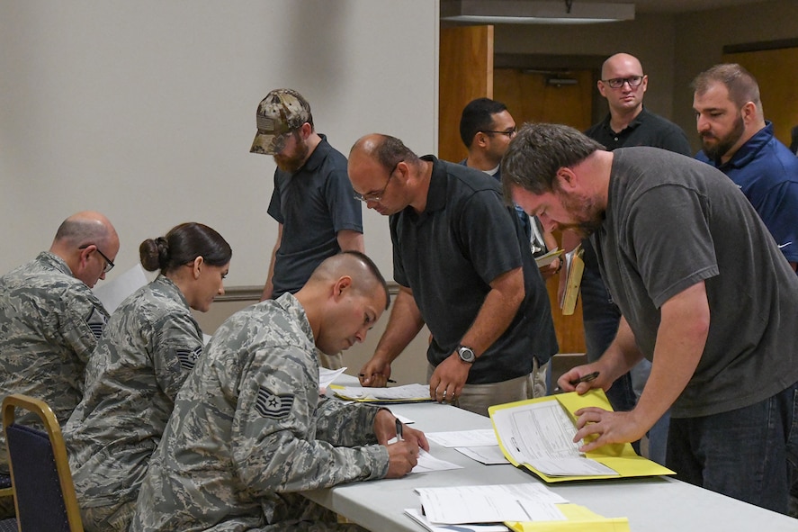 U.S. Airmen assigned to the 307th Medical Squadron review and update paperwork for Airmen assigned to the Individual Ready Reserves (IRR) during a Muster on Barksdale Air Force Base, La., Aug. 20, 2016. The annual IRR Muster provides IRR Airmen face to face briefings on member responsibilities as well as available Veteran’s benefits and career opportunities. (U.S. Air Force Photo by Master Sgt. Dachelle Melville/Released)