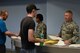 U.S. Air Force Airmen from the 307th Bomb Wing sign in and hand out paperwork to Airmen in the Individual Ready Reserves (IRR) during an annual Muster at Barksdale Air Force Base, La. on Aug. 20, 2016. During the Muster, IRR Airmen receive briefings on member responsibilities as well as available Veteran’s benefits and career opportunities. (U.S. Air Force Photo by Master Sgt. Dachelle Melville/Released)