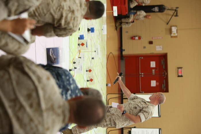 U.S. Marine Corps Major Bryan Hall briefing at the rehearsal of concepts drill during Bold Alligator 2016 at Camp Allen in Norfolk, Va., Aug. 13, 2016. BA16 focuses on improving Navy-Marine Corps amphibious core competencies along with coalition, North Atlantic Treaty Organization, Allied and partner nations as an investment in the current and future readiness of naval forces.