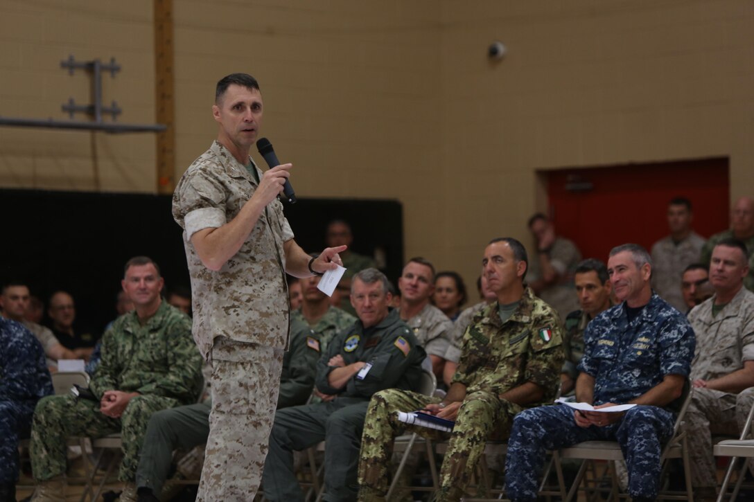 U.S. Marine Corps Brig. Gen. Robert F. Castellvi, commanding general, 2nd Marine Expeditionary Brigade, speaks to Marines, sailors, and partner nation service members after the rehearsal of concepts drill during Bold Alligator 2016 at Camp Allen in Norfolk, Va., Aug. 13, 2016. BA16 focuses on improving Navy-Marine Corps amphibious core competencies along with coalition, North Atlantic Treaty Organization, Allied and partner nations as an investment in the current and future readiness of naval forces.