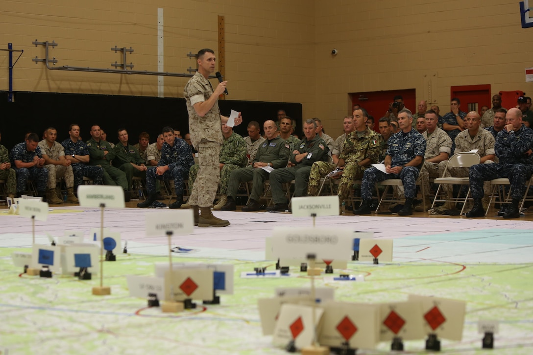 U.S. Marine Corps Brig. Gen. Robert F. Castellvi, commanding general, 2nd Marine Expeditionary Brigade, speaks to Marines, sailors, and partner nation service members after the rehearsal of concepts drill during Bold Alligator 2016 at Camp Allen in Norfolk, Va., Aug. 13, 2016. BA16 focuses on improving Navy-Marine Corps amphibious core competencies along with coalition, North Atlantic Treaty Organization, Allied and partner nations as an investment in the current and future readiness of naval forces.