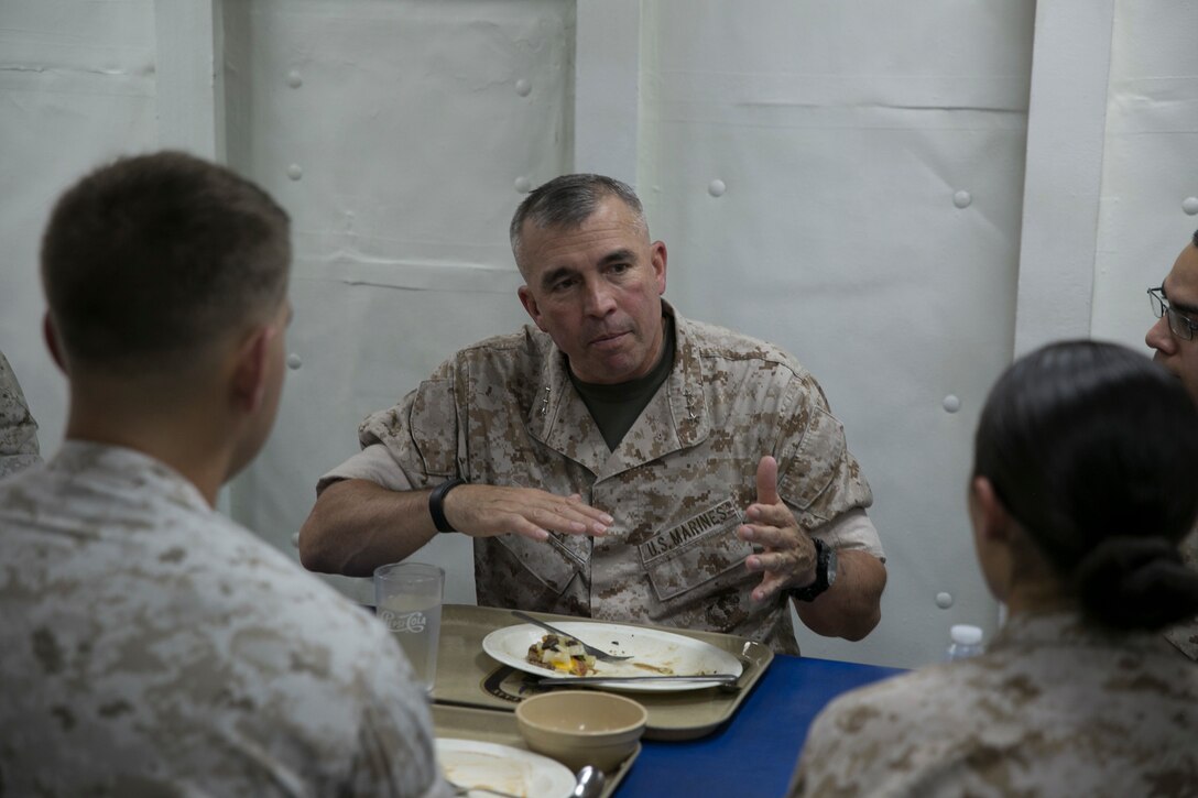 Commander, U.S. Marine Corps Forces Command, Lt. Gen. John E. Wissler, speaks with U.S. Marines participating in Bold Alligator 2016 during a visit aboard the amphibious assault ship USS Bataan (LHD 5) Aug 17, 2016. BA16 focuses on improving Navy-Marine Corps amphibious core competencies along with coalition, North Atlantic Treaty Organization, Allied and partner nations as an investment in the current and future readiness of naval forces. BA16 is taking place Aug. 15-26, 2016, along the eastern seaboard.